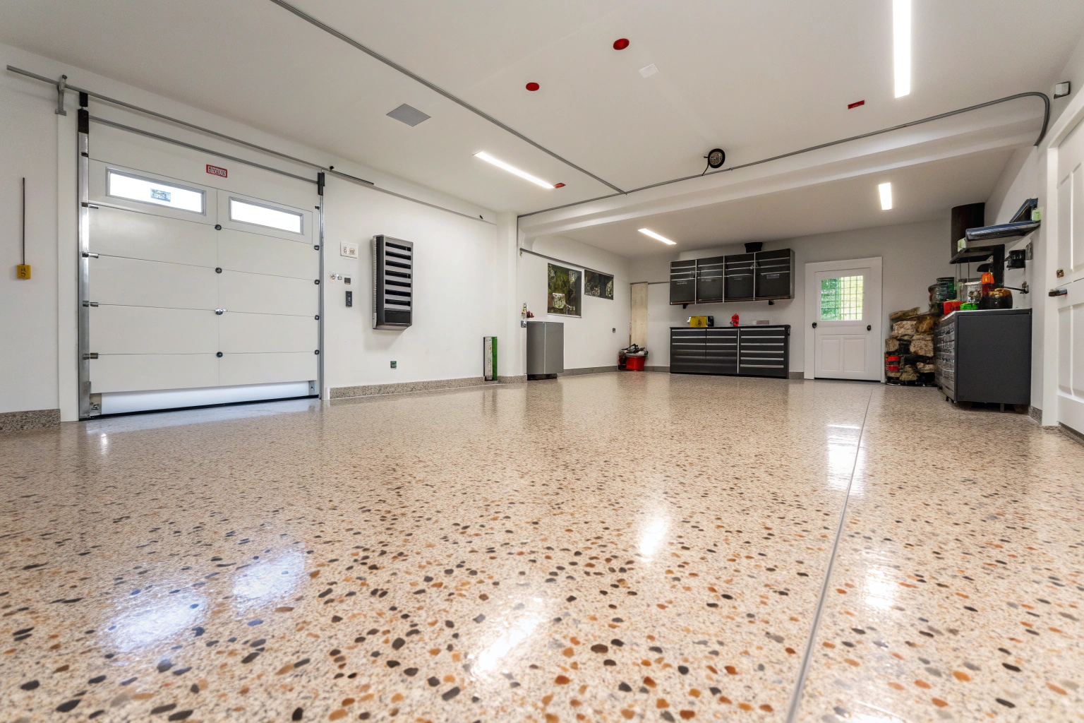 Modern Brisbane garage interior featuring a pristine epoxy floor